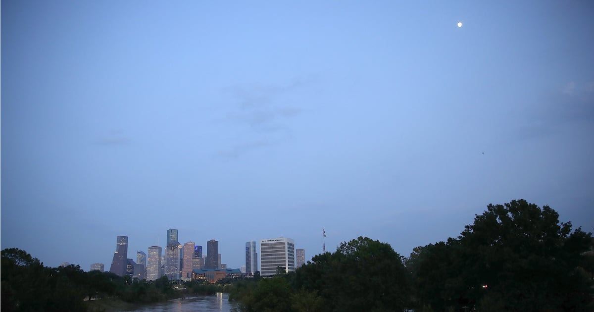 Buffalo Bayou, swollen with floodwaters in the wake of Hurricane Harvey, is shown with the Houston skyline in the background on September 1, 2017 in Houston, Texas. (Cover Image Source: Win McNamee/Getty Images)