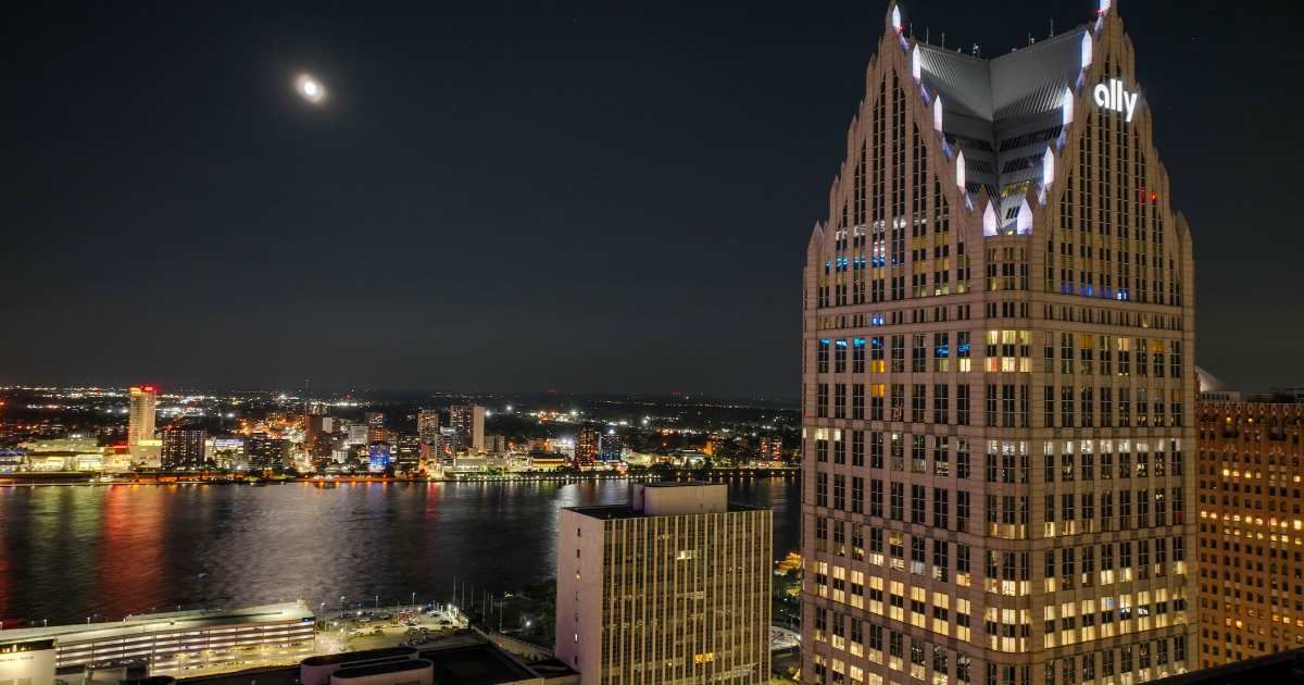 An aerial view of the cityscape of Detroit, Michigan, illuminated at night on July 16, 2023. (Cover Image Source: Getty Images | Wirestock)