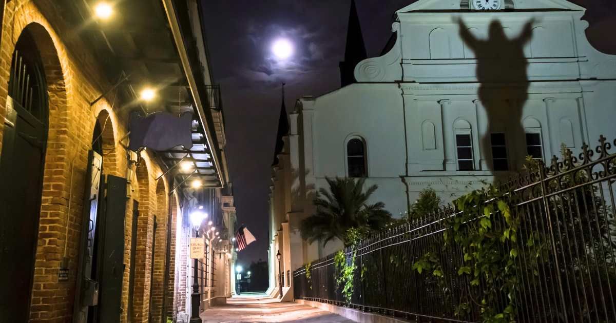 A Full Moon rises over Pere Antoine Alley and St. Anthony's Garden with a shadow on the rear of St. Louis Cathedral in the French Quarter of New Orleans, Louisiana. (Cover Image Source: Getty Images| 	lightphoto)