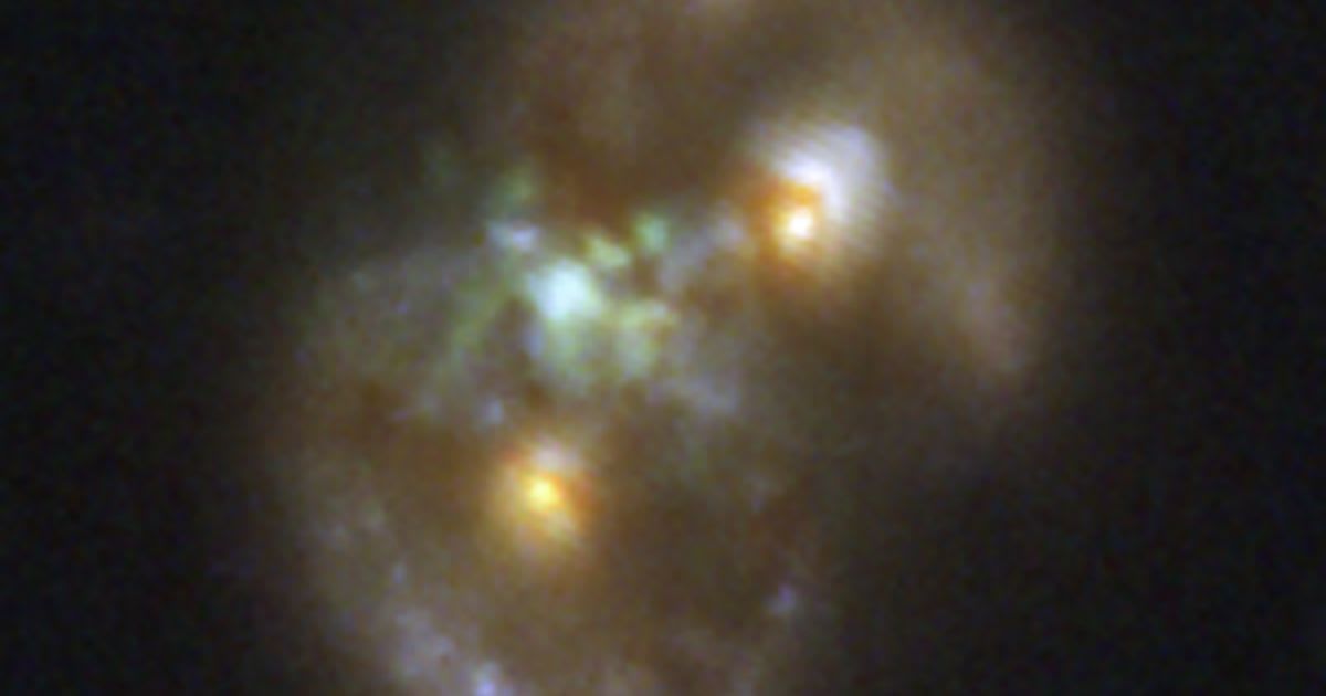 The Infinity Galaxy, the result of two colliding spiral galaxies, is composed of two rings of stars (seen as ovals at upper right and lower left) (Cover Image Source: NASA | P. van Dokkum)