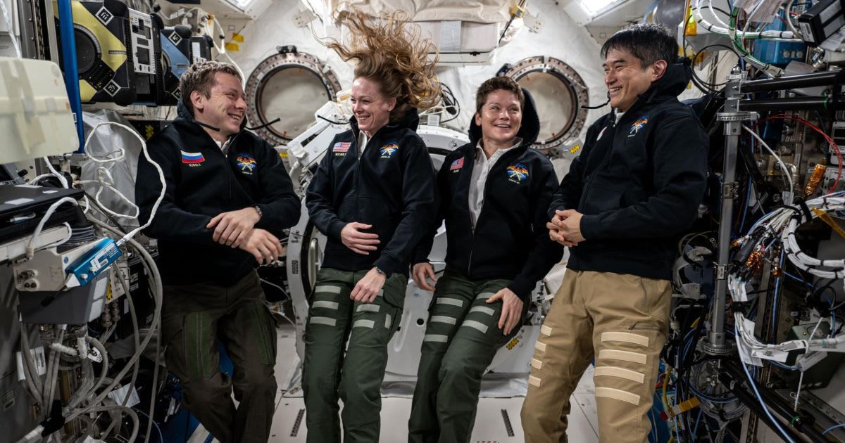 NASA’s SpaceX Crew-10 members Kirill Peskov of Roscosmos, NASA astronauts Nichole Ayers and Anne McClain, and JAXA astronaut Takuya Onishi share a light moment during a group portrait inside the Kibo laboratory module (Cover Image Source: NASA)