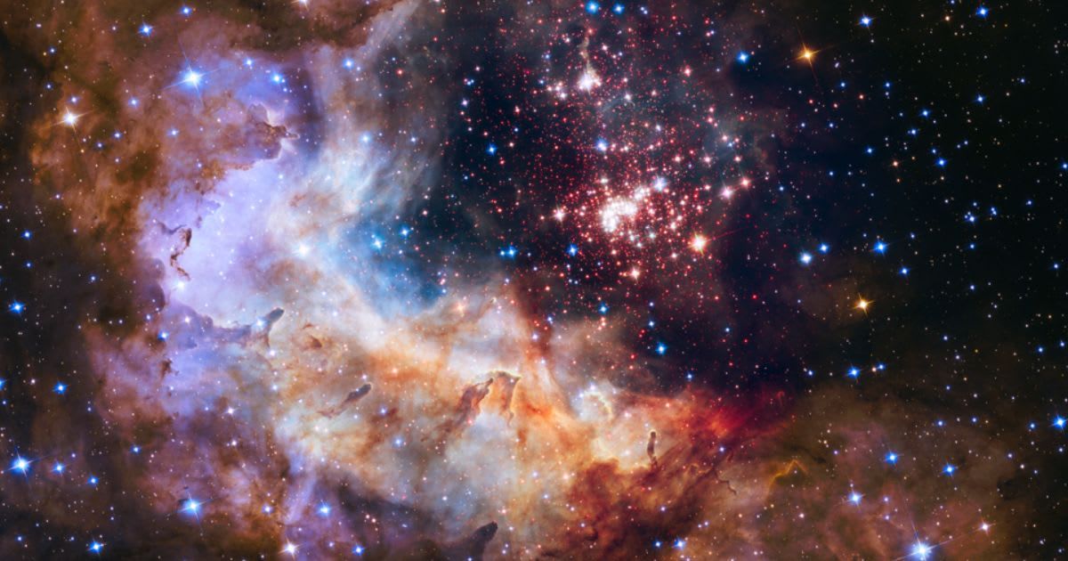 A brilliant tapestry of young stars flaring to life resembles a glittering fireworks display in this Hubble Space Telescope image (Representative Cover Image Source: NASA, ESA, the Hubble Heritage Team)