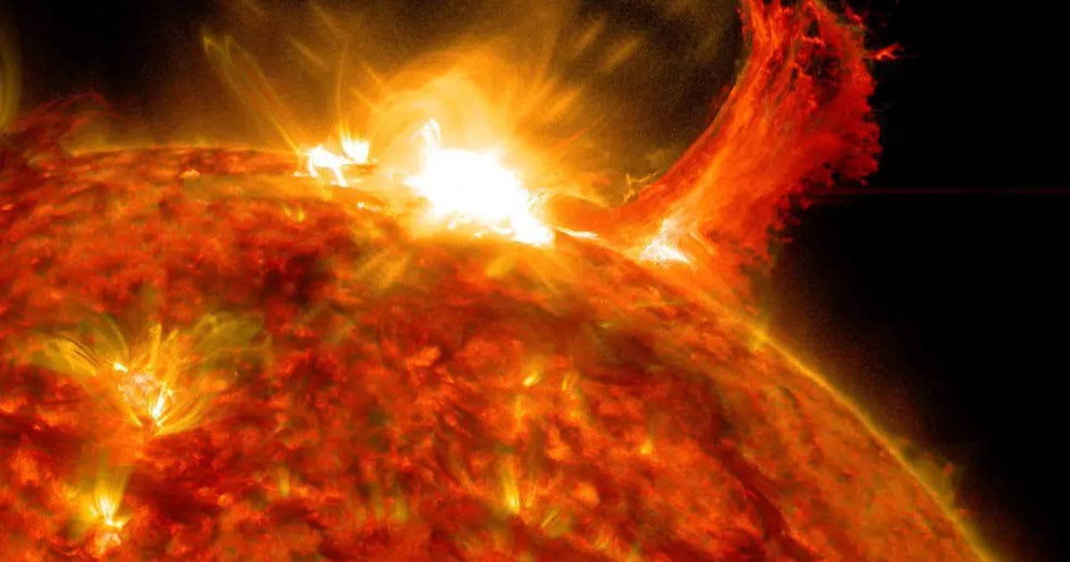 NASA’s Solar Dynamics Observatory captured this image of a solar flare on Oct. 2, 2014. The solar flare is the bright flash of light at the top (Cover Image Source: NASA/SDO)