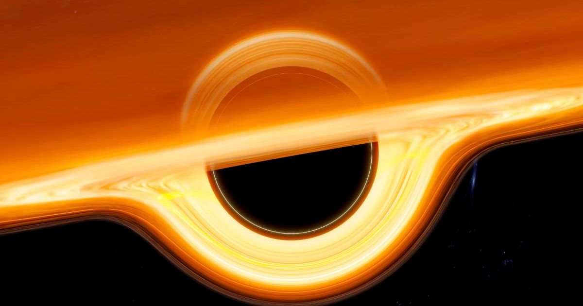 Artwork of a black hole surrounded by an accretion disc of material, the light from which is warped by the strong gravity. (RepresentativeCover Image Soource: Getty Images | Photo by MARK GARLICK / SCIENCE PHOTO LIBRARY)