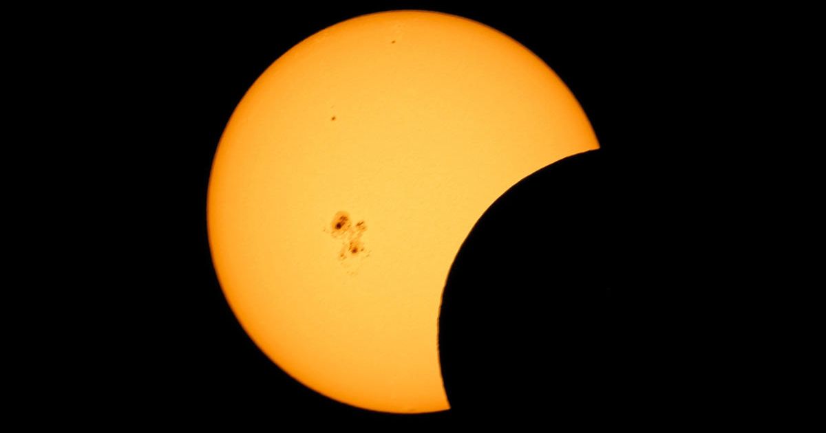 Partial solar eclipse with large sunspot as seen from southern New Mexico. (Representative Image Source: Getty Images | Photo by potenciaverde)