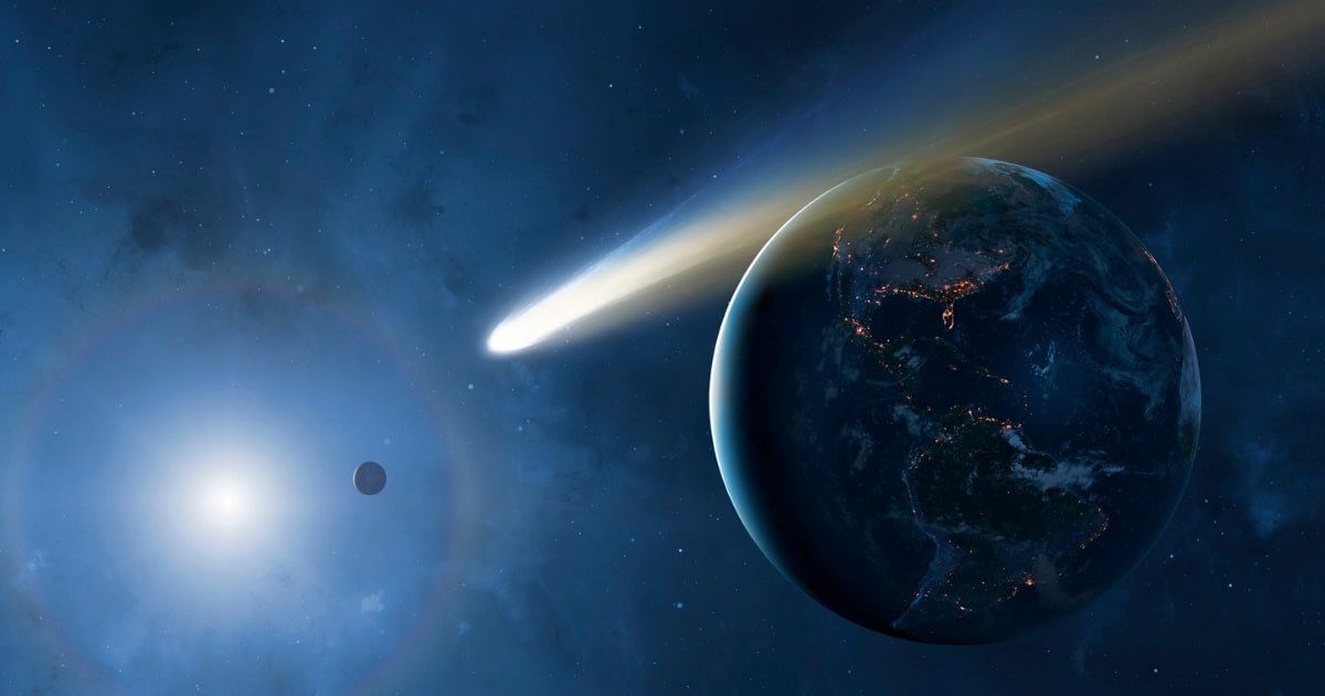 Illustration of the Earth, Moon, and Sun showing a passing comet (Representative Cover Image Source: Getty | MARK GARLICK/SCIENCE PHOTO LIBRARY)