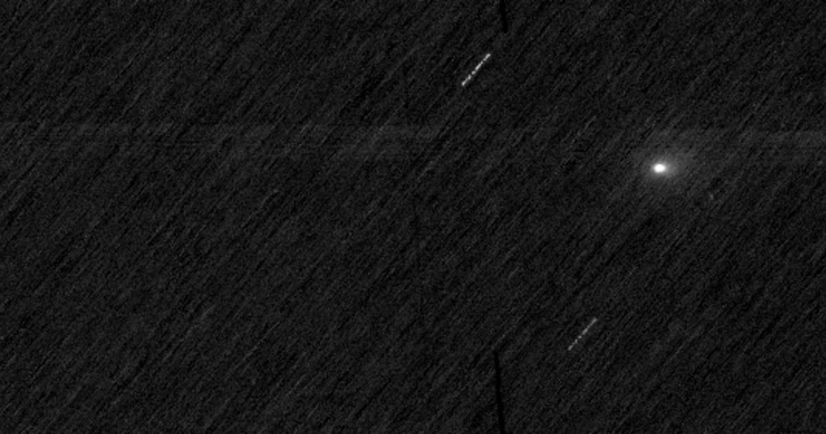A black space background with white streaks and a single fuzzy white dot. The streaks are stars and the dot is comet 3I/ATLAS (Cover Image Source: ESA/TGO/CaSSIS)