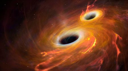 Astronomers achieve historic first image of two supermassive black holes orbiting each other