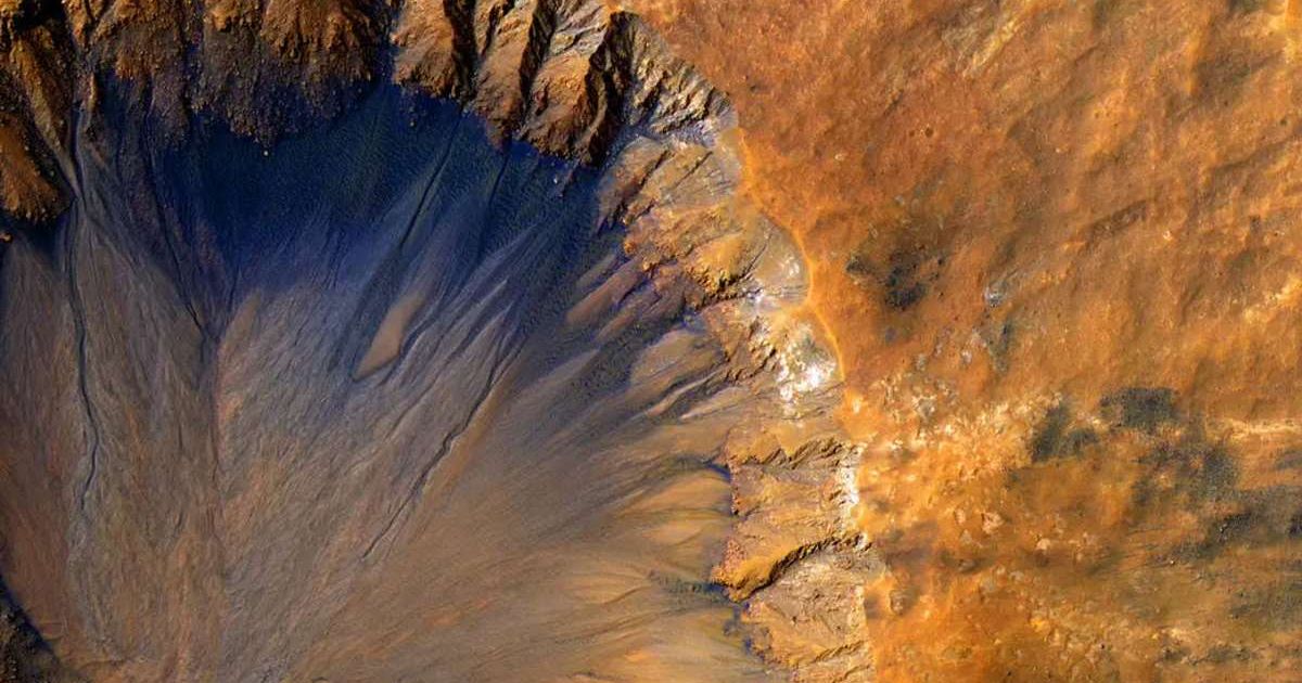The HiRISE camera aboard NASA's Mars Reconnaissance Orbiter acquired this closeup image of a "fresh" impact crater in the Sirenum Fossae region of Mars on March 30, 2015 (Cover Image Source: NASA/JPL)