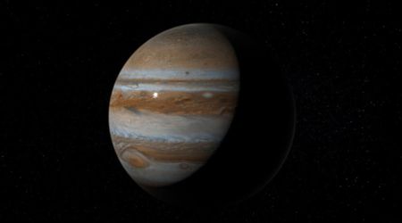 Jupiter's early growth reshaped the solar system and delayed the birth of Earth's rocky building blocks