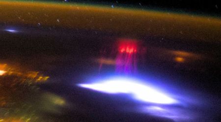 Strange gigantic ring of red light spotted in the night sky over central Italy