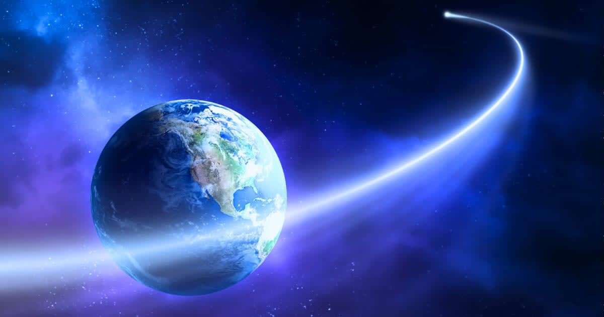 A stock image of a comet passing in front of planet Earth (Representative Cover Image Source: Getty | Johan63)