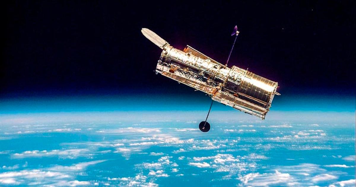 The Hubble Space Telescope returned to orbit as an improved telescope after its second servicing mission in February 1997. (Cover Image Source: NASA)