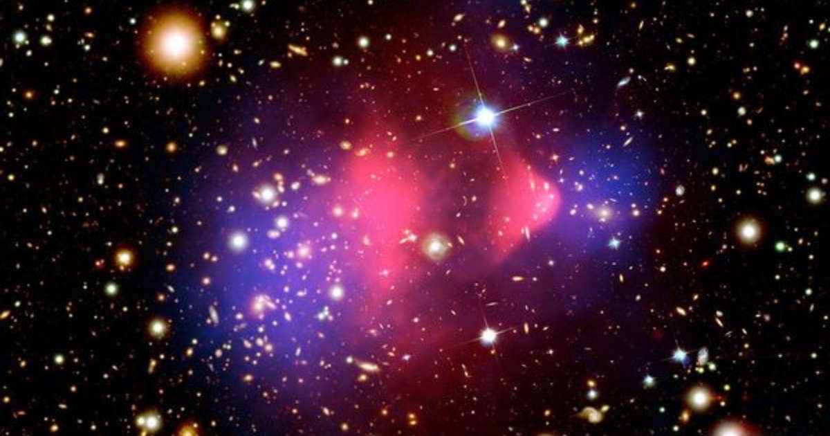 This composite image, captured using the Hubble Space Telescope, and Chandra X-ray Observatory, and the ground-based Giant Magellan Telescope, shows the Bullet Cluster, a pair of galaxy clusters that collided (Representative Cover Image Source: NASA)