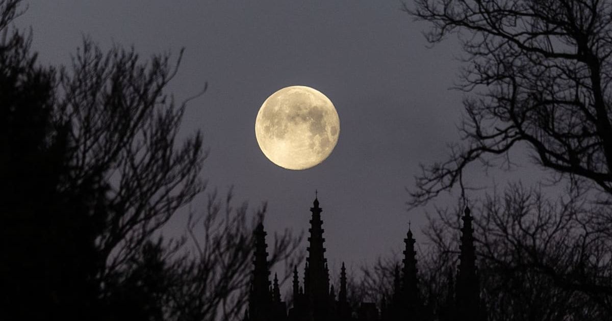 The Wolf Moon, the first full moon of the year, sets behind Downside Abbey on January 4, 2026, in Glastonbury, England (Representative Cover Image Source: Getty | Matt Cardy)