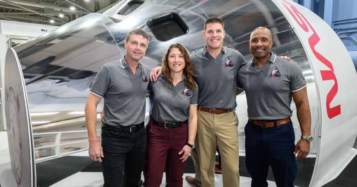 The Artemis II crew poses in front of an Orion simulator on January 23, 2026, at NASA’s Johnson Space Center in Houston. (Cover Image Source: NASA/Robert Markowitz)
