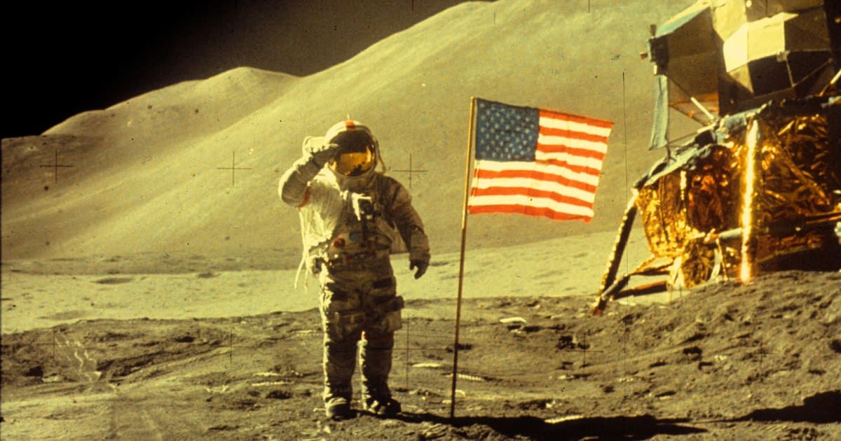 Astronaut David Scott gives a salute beside the U.S. flag on July 30, 1971 on the Moon during the Apollo 15 mission. (Representative Cover Image Source: NASA/Liaison)