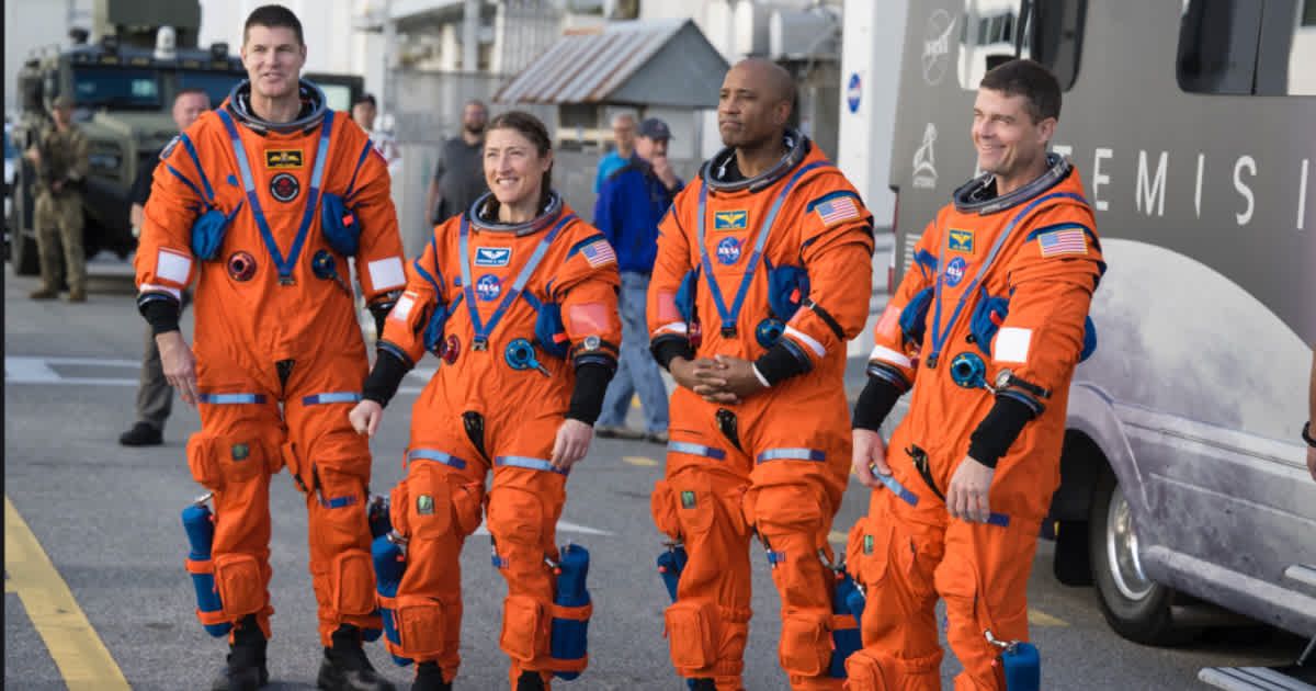 Artemis II crew after the countdown demonstration test on December 20, 2025, at NASA’s Kennedy Space Center in Florida. (Cover Image Source: NASA)