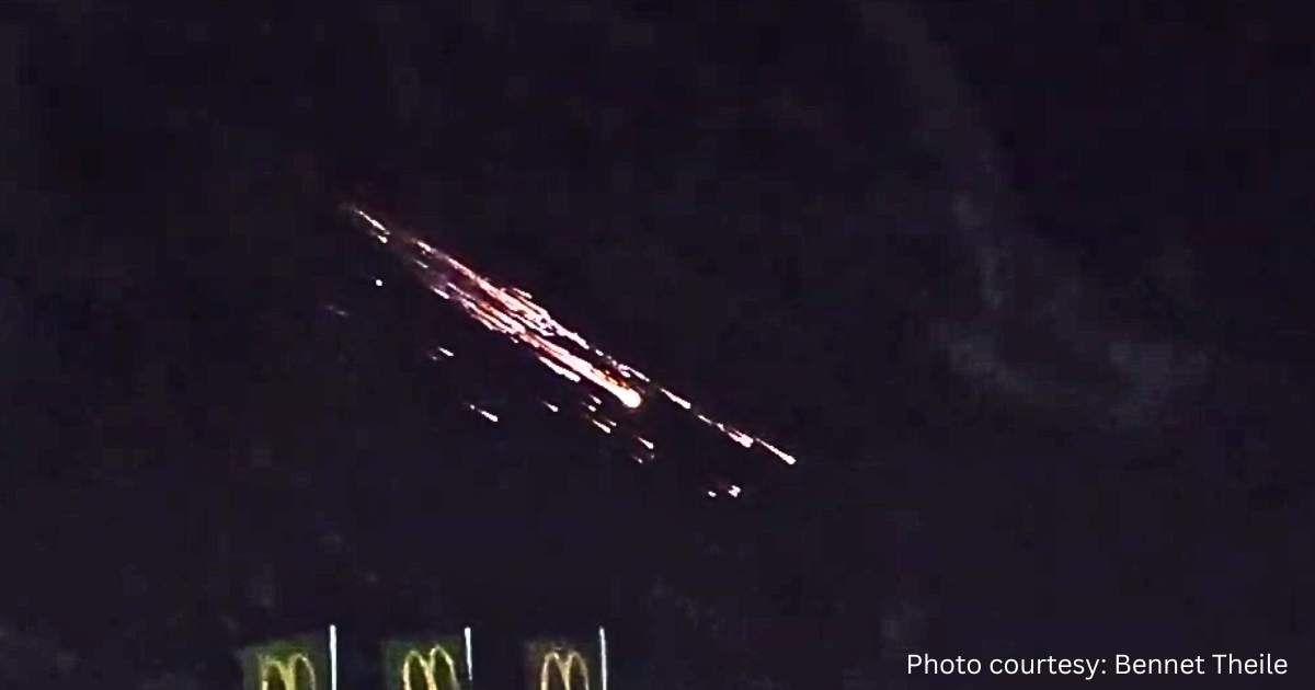 A screengrab from the video of the SpaceX Falcon 9 rocket falling apart over Ingersleben, Germany, on Feb. 19, 2025. (Cover Image Source: Bennett Theile); Image edited for clarity by Starlust Staff.