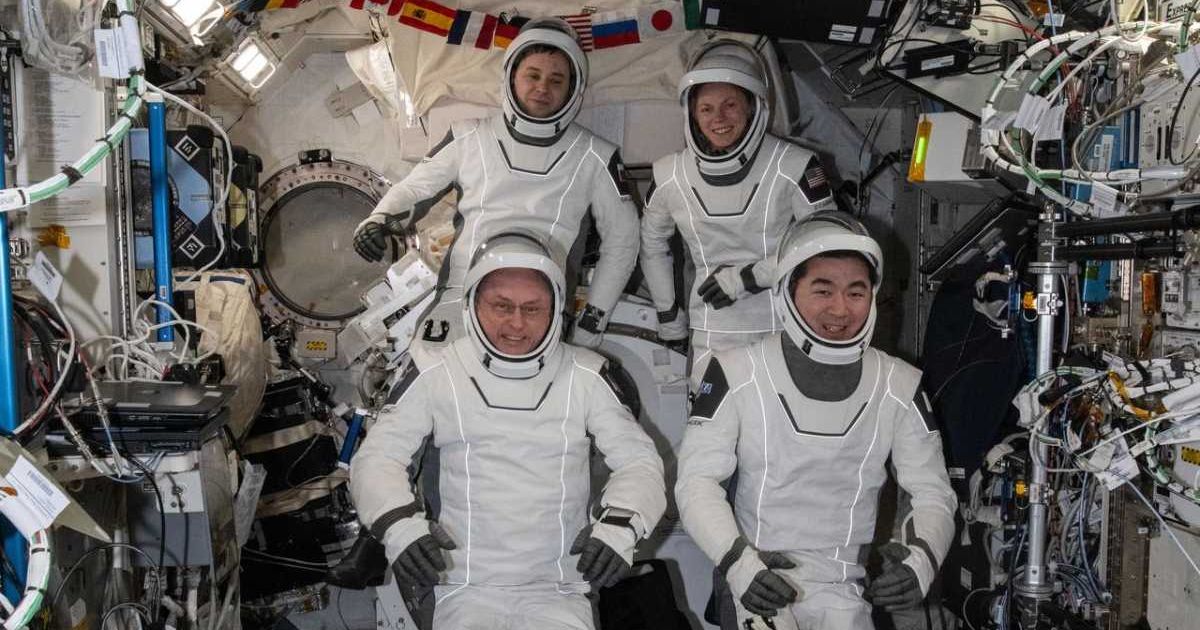 Four SpaceX Crew-11 members gather together for a crew portrait wearing their Dragon pressure suits during a suit verification check inside the International Space Station's Kibo laboratory module. (Cover Image Source: NASA)