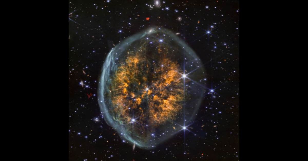 The Exposed Cranium nebula as imaged by the James Webb Space Telescope's NIRCam. [Cover Image Source: NASA, ESA, CSA, STScI; Image Processing: Joseph DePasquale (STScI); Image Edited by Starlust Staff)