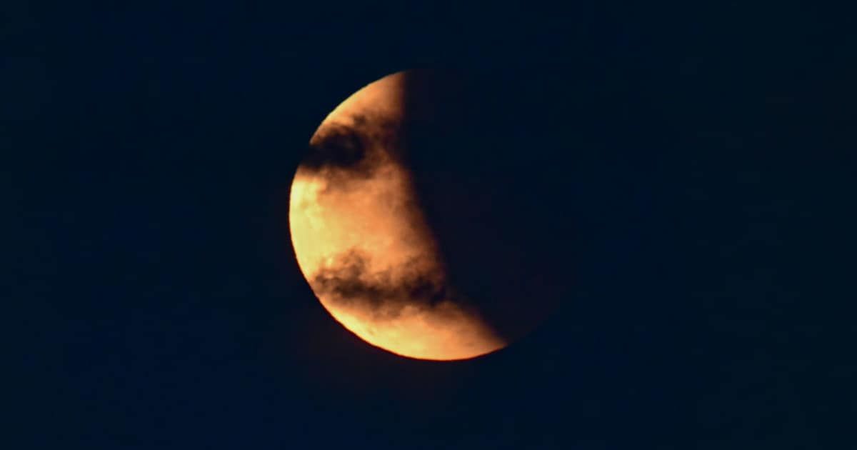 The rare red supermoon and total lunar eclipse seen together in the sky in Hohhot, Inner Mongolia, China, on 26th May, 2021. (Cover Image Source: TPG/Getty Images)