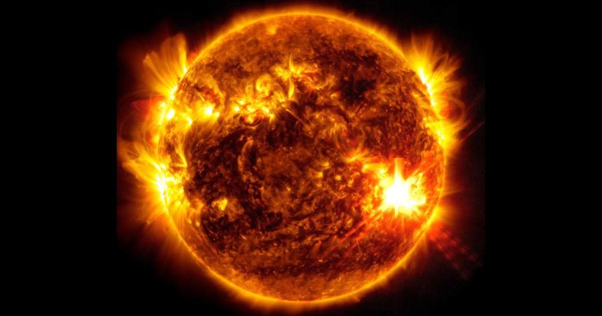 An X-class solar flare appears in the lower right part of the Sun in this extreme ultraviolet image from NASA's Solar Dynamics Observatory. (Cover Image Source: NASA/SDO; Image Edited by Starlust Staff)