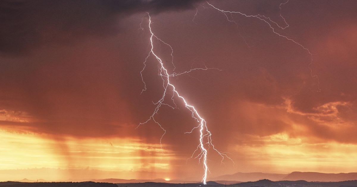 Image of lightning forks across a stormy sky at sunset. (Representative Cover Image source: Nordseher / Pixabay)