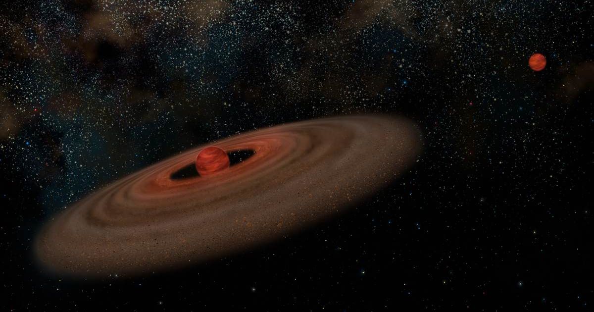 Artist's conception of binary system 2M J044144 showing brown dwarf estimated to be approximately 20 times mass of Jupiter (left) and its companion that is estimated to be 7 times mass of Jupiter (right). (Representative Cover Image Source: NASA)