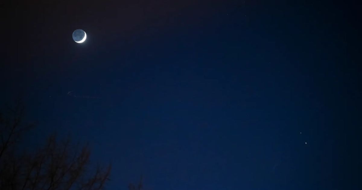 The Moon, left, Saturn, upper right, and Jupiter, lower right, are seen after sunset from Washington, DC, on Dec. 17, 2020 (Representative Cover Image Source: NASA | Aubrey Gemignani)