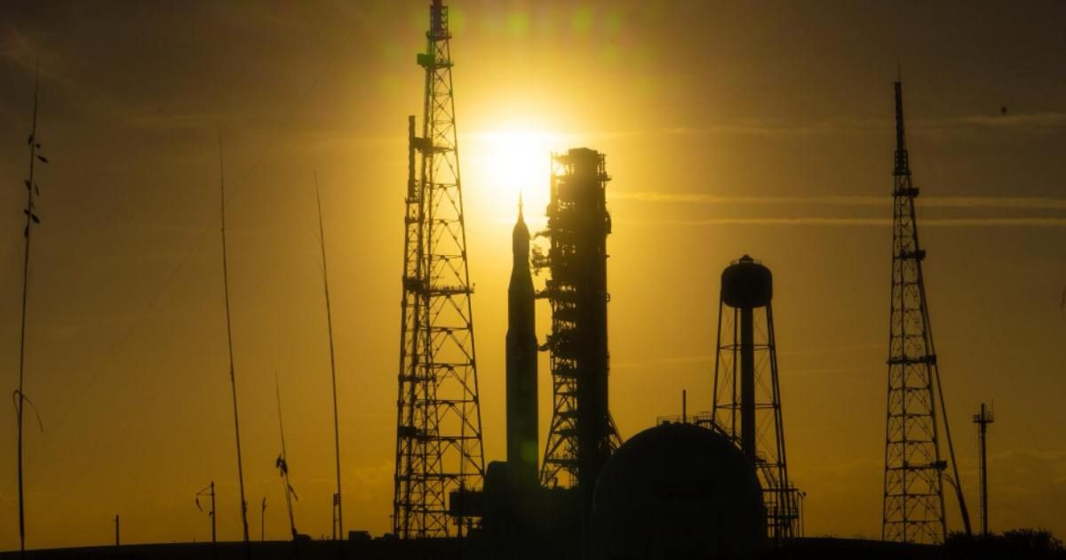 NASA’s SLS (Space Launch System) and Orion spacecraft rolling out of the Vehicle Assembly Building to Launch Pad 39B at NASA’s Kennedy Space Center. (Representative Cover Image Source: NASA | Sam Lott)