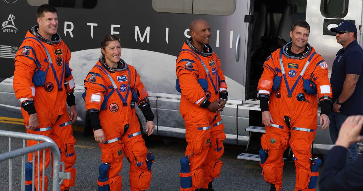 The Artemis II crew rehearses a walkout from the Neil A. Armstrong Operations and Checkout Building; (Cover Image Source: Getty Images | Photo by Joe Raedle)