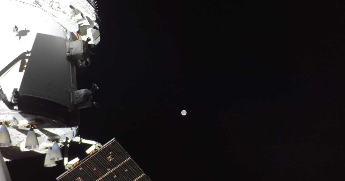 This photo shows the Artemis II Orion spacecraft with the Moon in the distance, as captured by a camera on the tip of one of its solar array wings. (Cover Image Source: NASA)