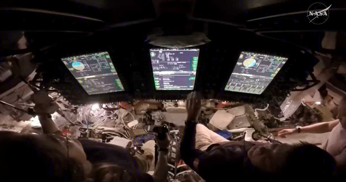 Christina Koch, left, takes control of the Orion spacecraft during a manual piloting test on day 4 of the Artemis II mission. To her right is Canadian Space Agency’s Jeremy Hansen and NASA astronaut Victor Glover. (Image Source: NASA)