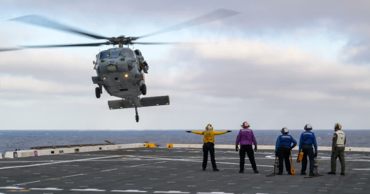 U.S. Navy MH-60 Seahawks from Helicopter Sea Combat Squadron (HSC) 23 arriving on the deck of USS John P. Murtha for the return of the Artemis II crew on April 6, 2026. (Cover Image Source: NASA)