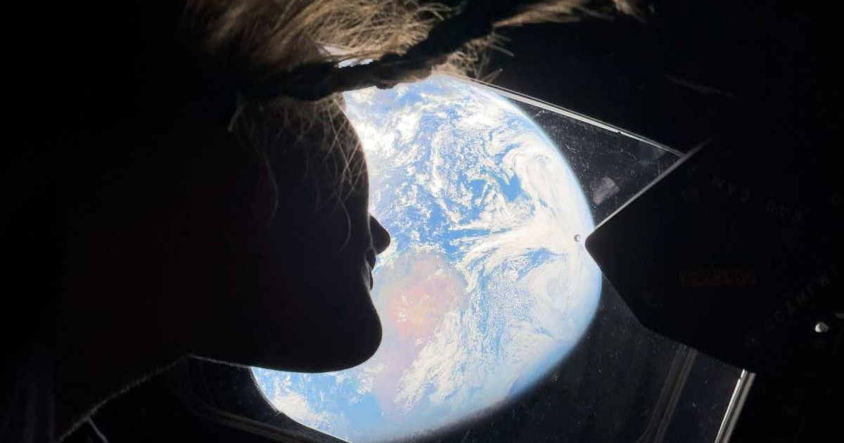 NASA astronaut and Artemis II mission specialist Christina Koch peers out of one of the Orion spacecraft's main cabin windows, looking back at Earth, as the crew travels towards the Moon. (Cover Image Source: NASA)