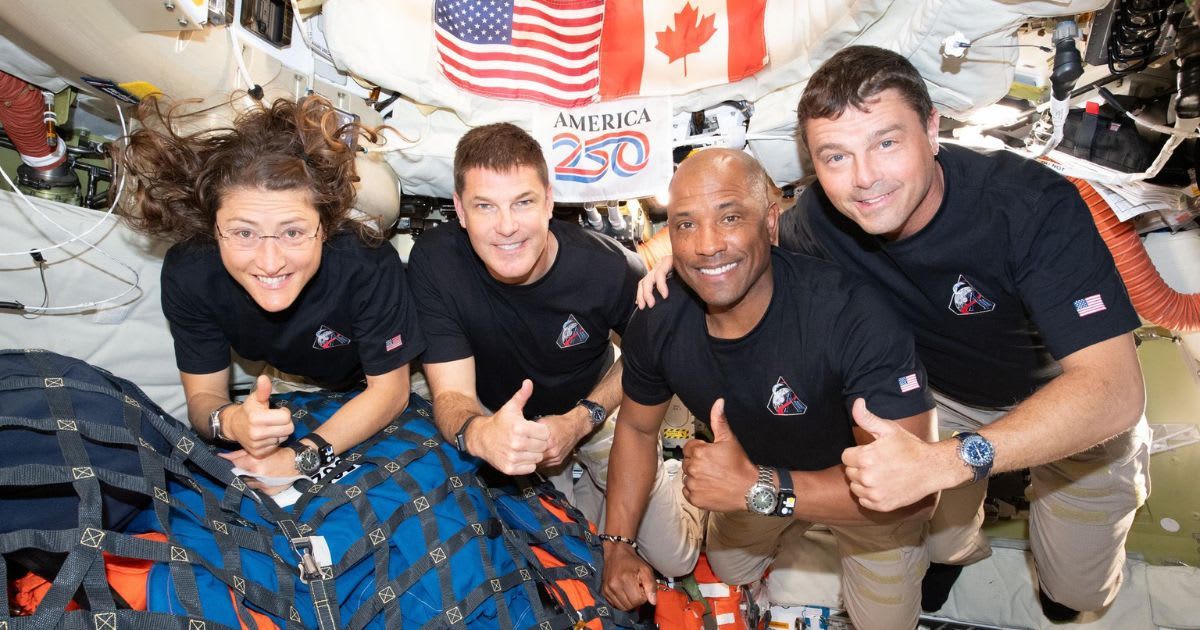 The Artemis II crew – (from left) Mission Specialist Christina Koch, Mission Specialist Jeremy Hansen, Pilot Victor Glover, and Commander Reid Wiseman – pause for a group photo inside the Orion spacecraft on their way home. (Cover Image Source: NASA)