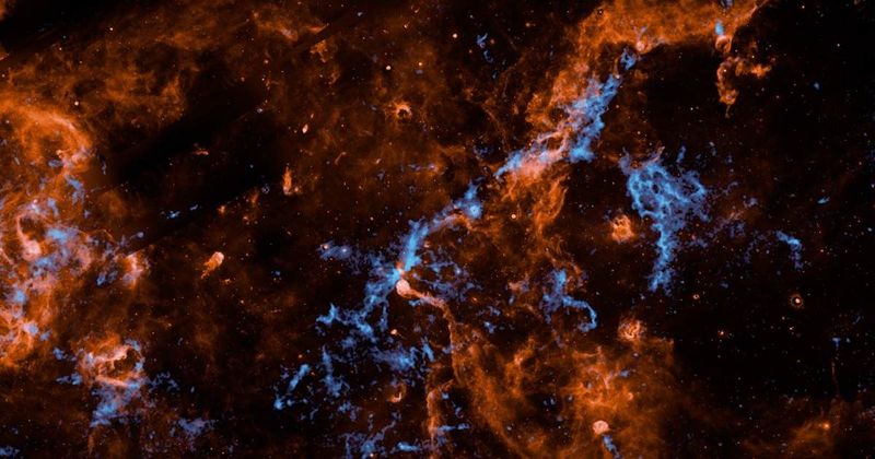 NASA's SPHEREx observes ice on dust particles in a turbulent star-forming region of the Milky Way
