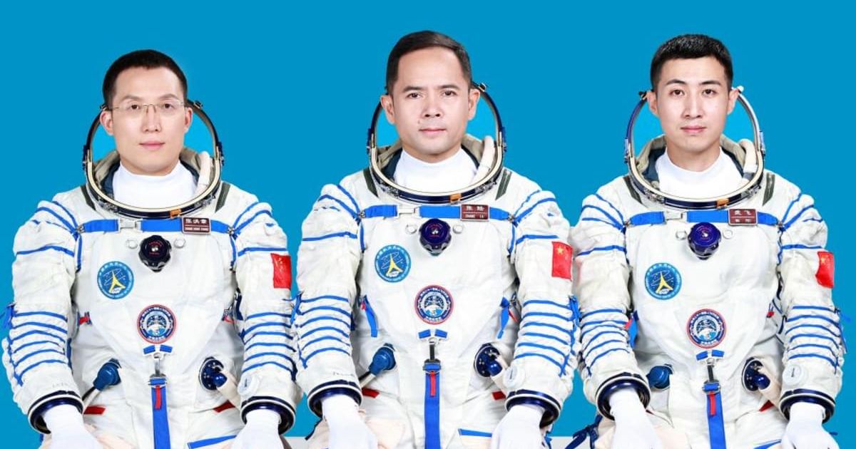 This photo shows Shenzhou-21 crew members Zhang Lu (commander, center), Wu Fei (to the right) and Zhang Hongzhang (left) (Cover Image Source: Xinhua)