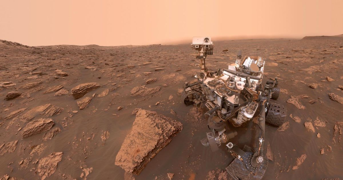 A self-portrait of NASA’s Curiosity rover taken on June 15, 2018, when a Martian dust storm had reduced sunlight and visibility at the rover’s location in Gale Crater. (Cover Image Source: NASA/JPL-Caltech/MSSS)