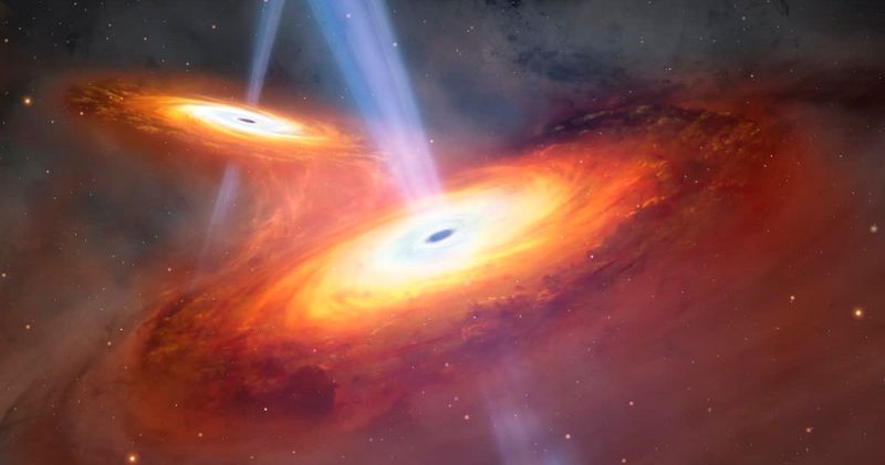 Rare twin quasars caught merging in early universe—they are connected by a cosmic gas bridge