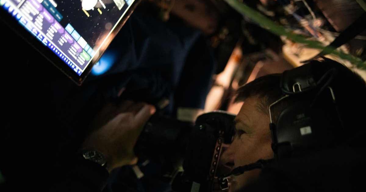 CSA (Canadian Space Agency) astronaut and Artemis II Mission Specialist Jeremy Hansen is seen taking images through the Orion spacecraft window during the Artemis II lunar flyby. (Cover Image Source: NASA)