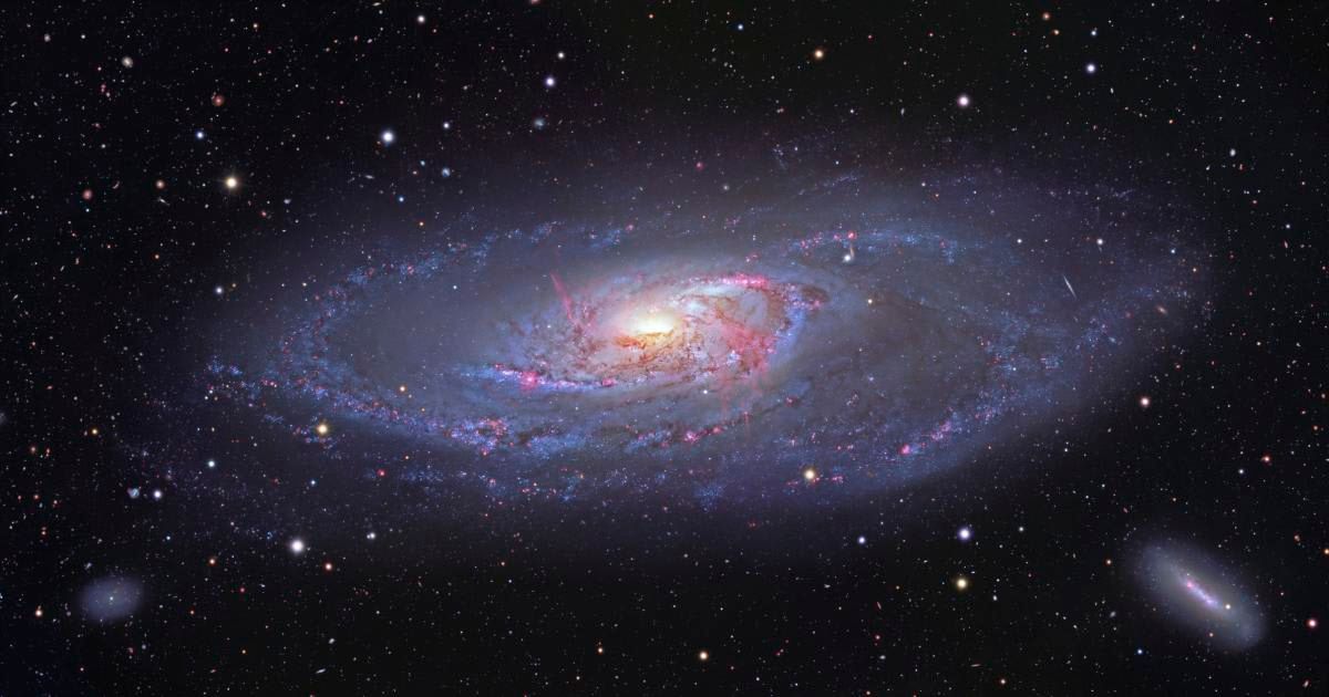  Image of the spiral galaxy Messier 106 (M106), also known as NGC 4258, which measures 135,000 light years across and lies 25 million light years from Earth, in the constellation Canes Venatici.
