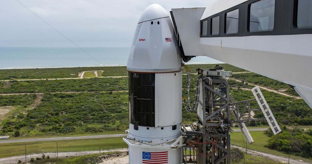 SpaceX's Dragon spacecraft atop SpaceX Falcon 9 rocket, stands in a vertical position at Space Launch Complex 40 at Cape Canaveral Space Force Station in Florida. (Image Source: NASA)