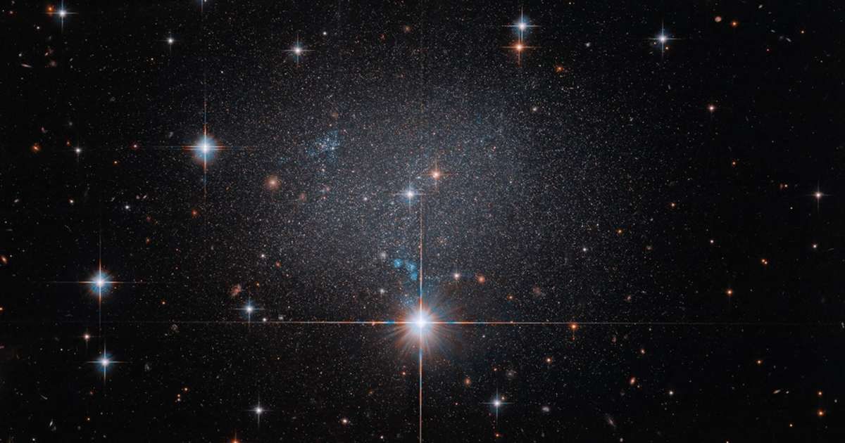 HST captures the dwarf irregular galaxy ESO 490-017. [Cover Image Source: NASA | ESA | R. Tully (University of Hawaii) | Image Processing: G. Kober (NASA/Catholic University of America)]