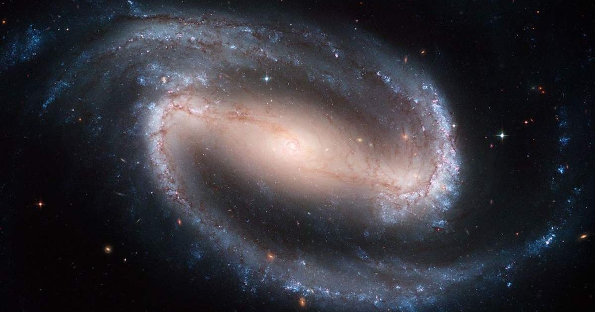 Barred spiral galaxy NGC 1300 as imaged by the Hubble Space Telescope. [Representative Cover Image Source: NASA/ESA/The Hubble Heritage Team (STScI/AURA); Acknowledgement: P.Knezek (WIYN)]
