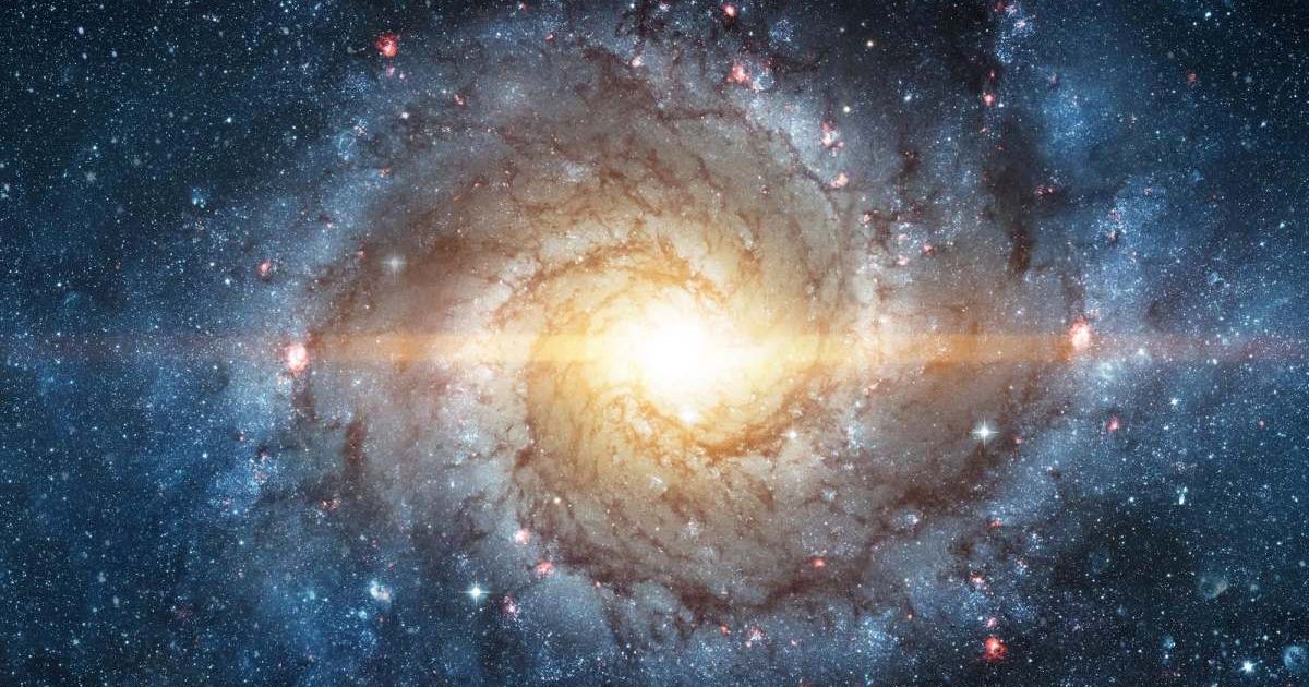 Picture of a dust-shrouded spiral galaxy (Cover Image Source: Shutterstock)