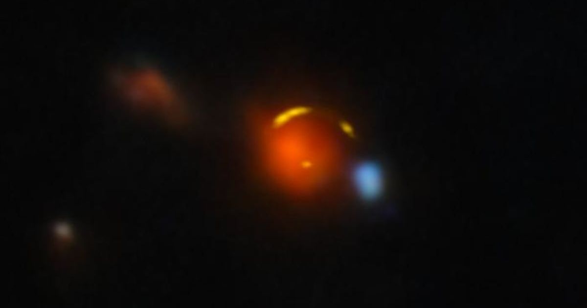 The gravitationally lensed galaxy nicknamed "Shadow Blaster," which astronomers have identified as the likely source of the high-energy neutrino event IC 210922A. [Cover Image Source:International Gemini Observatory/NOIRLab/NSF/AURA/ALMA (ESO/NAOJ/NRAO)]