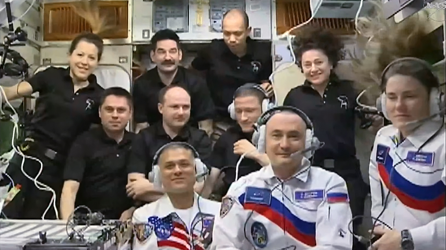 Anil Menon, Anna Kikina and Pyotr Dubrov with Expedition 74 aboard the ISS.