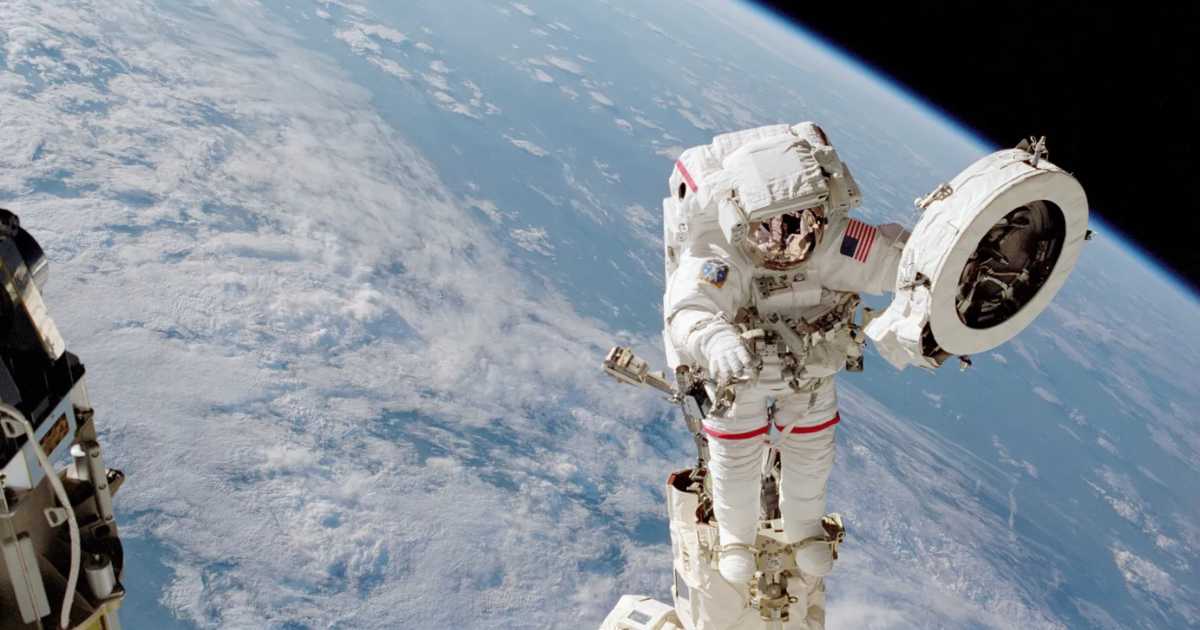 Astronaut Franklin R. Chang-Diaz works with a grapple fixture during a June 2002 spacewalk, the first EVA of the STS-111 mission. — (Representative Cover Image Source: NASA)